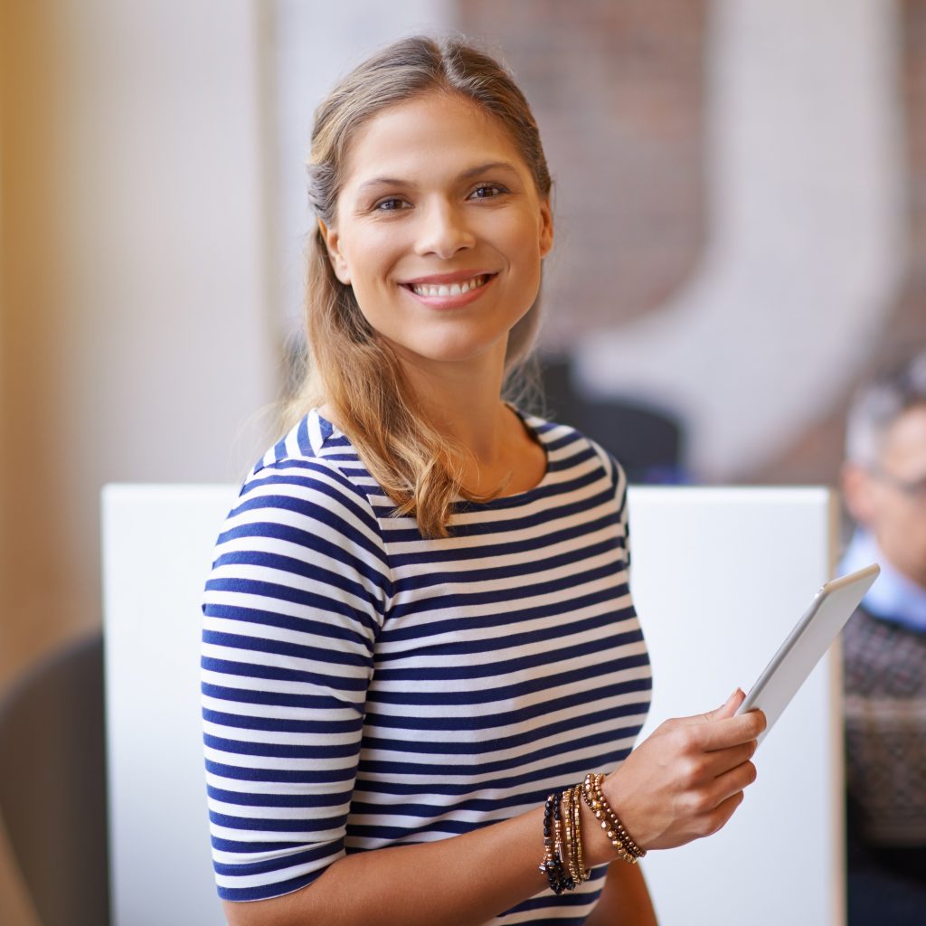 Shot of a young businesswoman using a digital tablet in the office